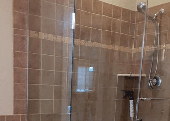 Elevating Bathroom Aesthetics: Glass Shower Door Installation in Plant City, FL
